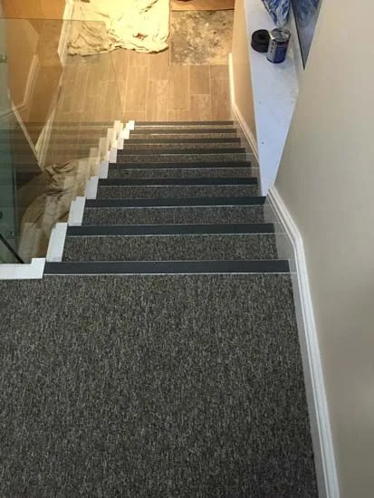 Carpeted staircase by Lorenzo Carpets