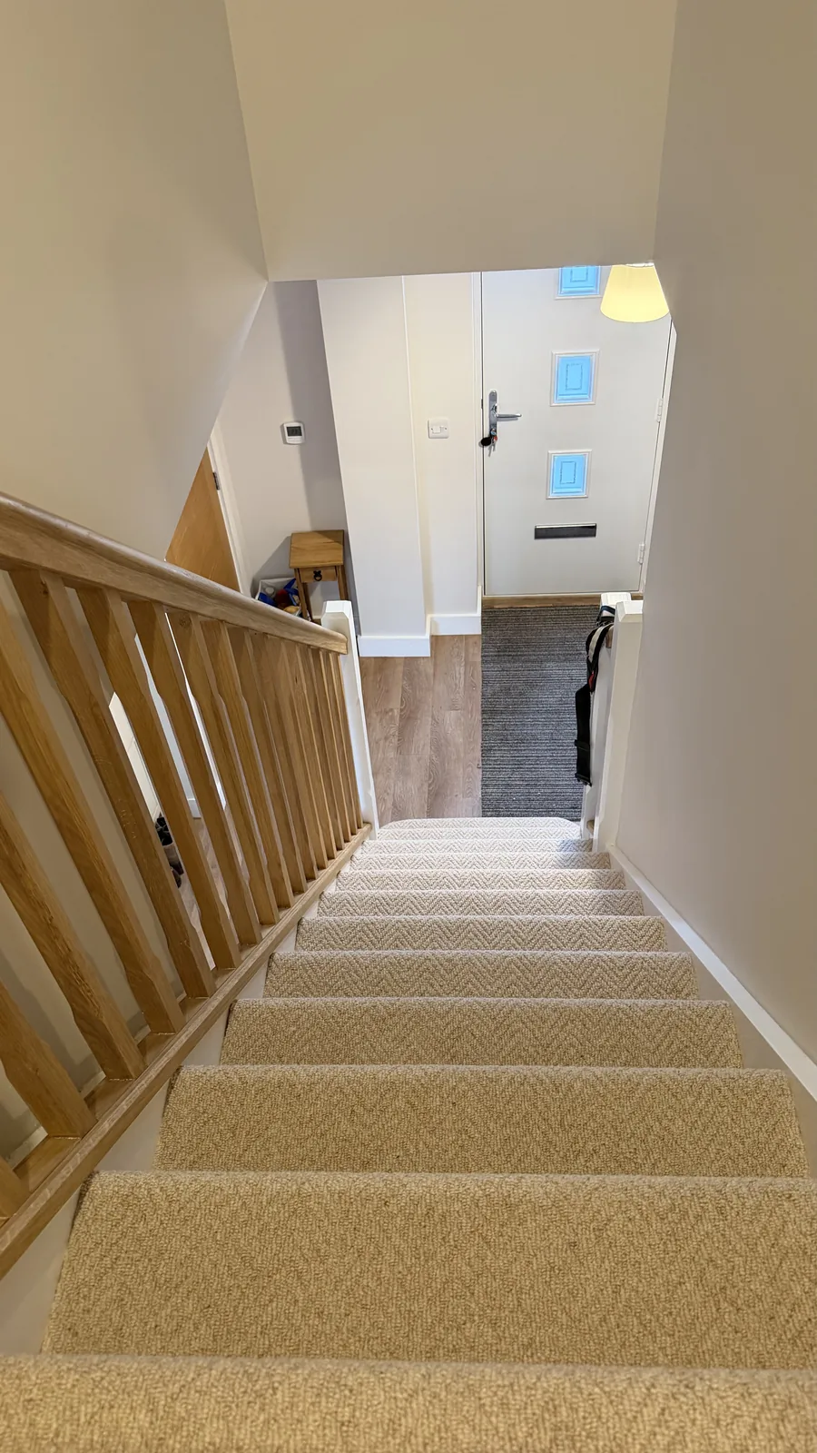 Neutral carpet fitted across stairs and landing