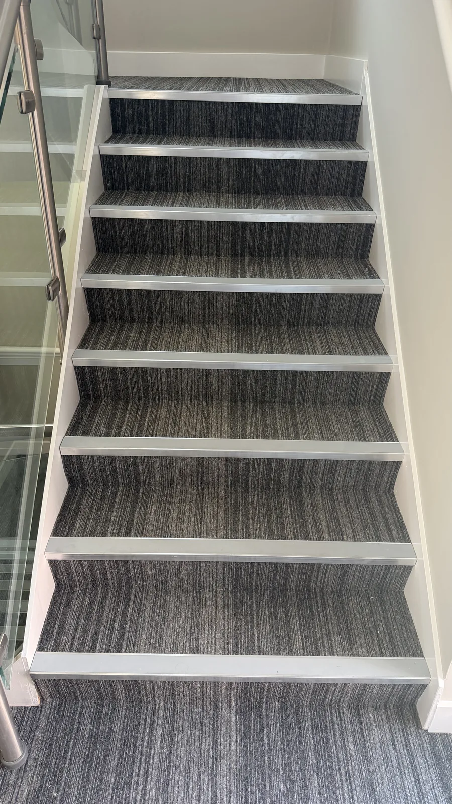 Commercial carpeted staircase by Lorenzo Carpets